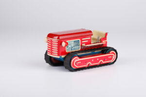Pásový traktor na elektrický pohon, hračka + papierová krabica + kontrolný reklamačný lístok